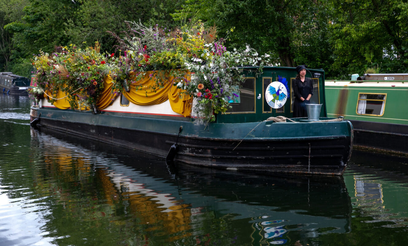Thelma's funeral procession;
Broadway Market Lock to The Barge Hse;
Hackney canal, London. N1 5RY.
14th July 2020.

© Pete Jones
pete@pjproductions.co.uk